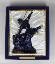 A bottle of Remy Martin Fine Champagne Cognac, in a Limoges blue centaure design decanter, 68cl,