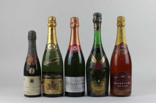 A bottle of Martivey Rose Champagne a bottle of Castel D'Ordal Sekt, bottle of Castellblanch Cava,