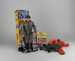 A Palitoy Action Man, boxed, together with a small collection of accessories