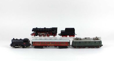 A Trix Express model railway locomotive, a Trix Model coach, a Marklin H0 gauge DA 800 locomotive