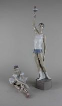 A Lladro figurine of an Olympic Torch Bearer holding the Olympic flame with arm raised, 42.5cms high