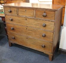 A 19th century mahogany chest of three short over three graduated drawers with string inlay and knob