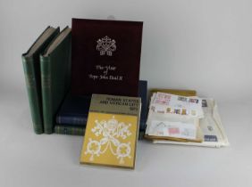 A collection of Vatican stamps and First Day Covers five albums and some loose, together with a 1973