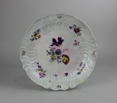 A Meissen porcelain dish decorated with flowers on white ground 34.5cm diameter (a/f - restored)