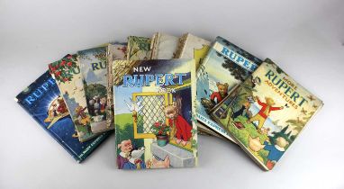 A collection of ten 1940s and later Rupert Bear annuals and books, to include Rupert In More
