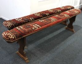 Two wooden long benches with loose fitting tapestry cushions, 206cm