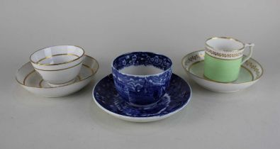 A mixed lot of three cups and saucers comprising of Crown Derby, Wedgewood and one other