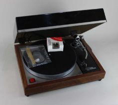 A Linn Sondek LP12 record deck with perspex lid, with (unopened) Ortofon MC15 Super II and SME