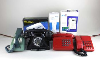 A collection of assorted telephones, some boxed, to include a GPO black bakelite telephone 164 47 (