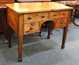 A 19th century mahogany kneehole desk or dressing table with rectangular top, four drawers with knob