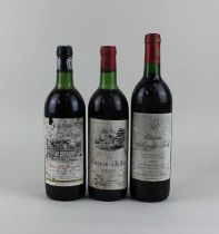 A bottle of Chateau Labegorce Zede 1993 Margaux red wine a bottle of Chateau du Rauly 1976