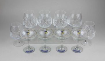 A set of four Babycham glasses with gilt rims, together with a set of six cut glass brandy glasses