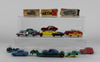 Six Dinky Toys model motor vehicles, to include a 242 Ferrari Racing Car, boxed, and an Austin