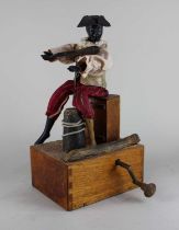 A Gustave Vichy style automaton of a figure dressed in pirate costume playing a violin, 38cm high