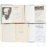 Vier Bücher mit handschriftlichen Unterschriften von Yuri Gagarin, Mickail Gorbatschev und Aleksandr