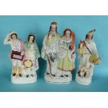 A good Staffordshire group of a couple she with a tambourine, 320mm, a figure of a drummer