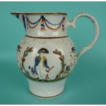 Nelson: a Prattware jug moulded with ships and figures decorated in typical palette, circa 1800,