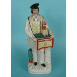 A good and colourful Staffordshire figure of an organ grinder with his monkey, circa 1850, 381mm