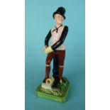 Sam Weller and the Pickwick Papers: a fine Staffordshire figure by James Dudson depicted as a shoe