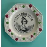 1838 Coronation: an octagonal pottery nursery plate printed in black with an inscribed portrait