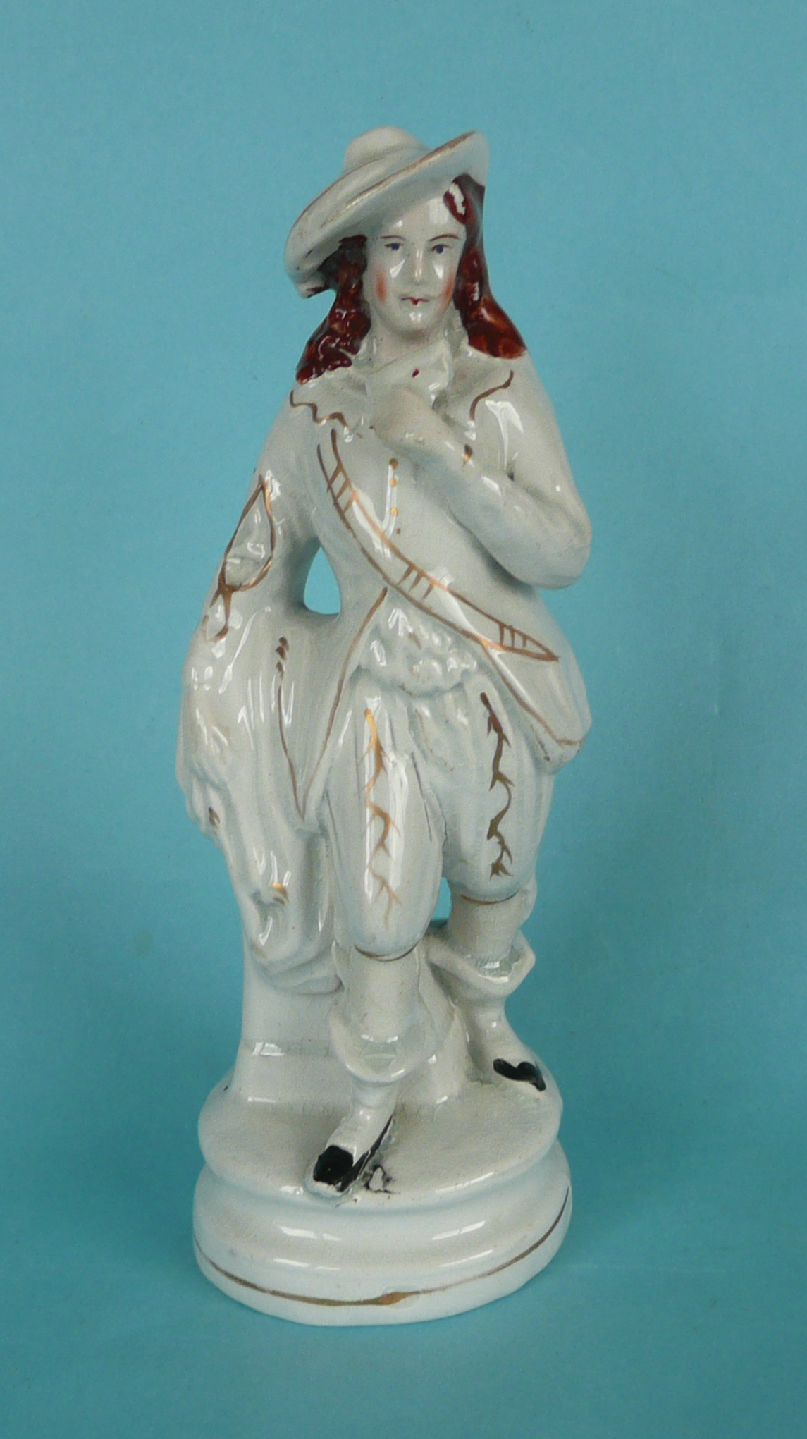 A good Staffordshire figure of a dandy holding a letter, circa 1850, 231mm
