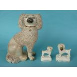 Two good Staffordshire pottery models of poodle dogs, circa 1860 and another larger, seated