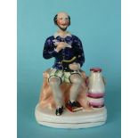 Shakespeare: a colourful figure unusually depicted seated, circa 1845, 175mm
