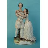 Romeo and Juliet: a good Staffordshire group by Thomas Parr, the base well painted and the figures