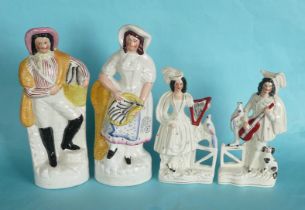 A colourful pair of Staffordshire figures of fishmongers, circa 1880, 345mm