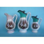 A pale aubergine jug, 205mm and two others: Shells, all in good condition (3)