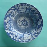 George III: a pearlware soup bowl printed all over in blue and centred by a medallion