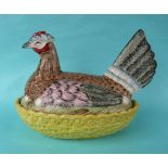 A good and colourful Staffordshire pottery tureen and cover modelled as a hen on a basket