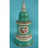 An elaborate tobacco jar, domed cover and stand painted with an oval floral cartouche