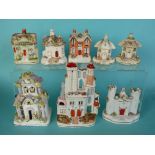 A collection of eight 19th century Staffordshire cottage pastille burners, one with separate base