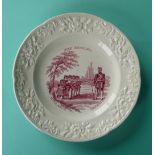 A nursery plate with moulded floral border, printed in pink with military scenes, circa 1860, 187mm,
