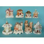 A collection of eight 19th century Staffordshire cottage pastille burners, one with separate base,