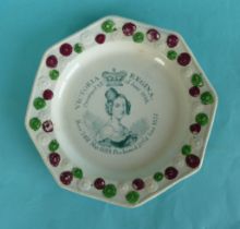 1838 Coronation: an octagonal pottery plate with colourful florette moulded border printed in