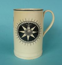 A cylindrical creamware tankard printed in black with a compass centred by a portrait and on the