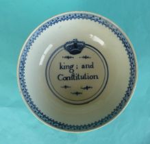 A good pearlware bowl, painted in blue with the inscription ‘King and Constitution’ surmounted by