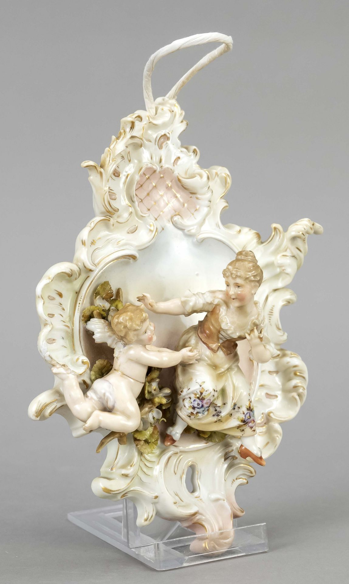 Figural wall applique, Triebner, Ens & Co., Volkstedt, Thuringia, mark 1894-1899, floating putto