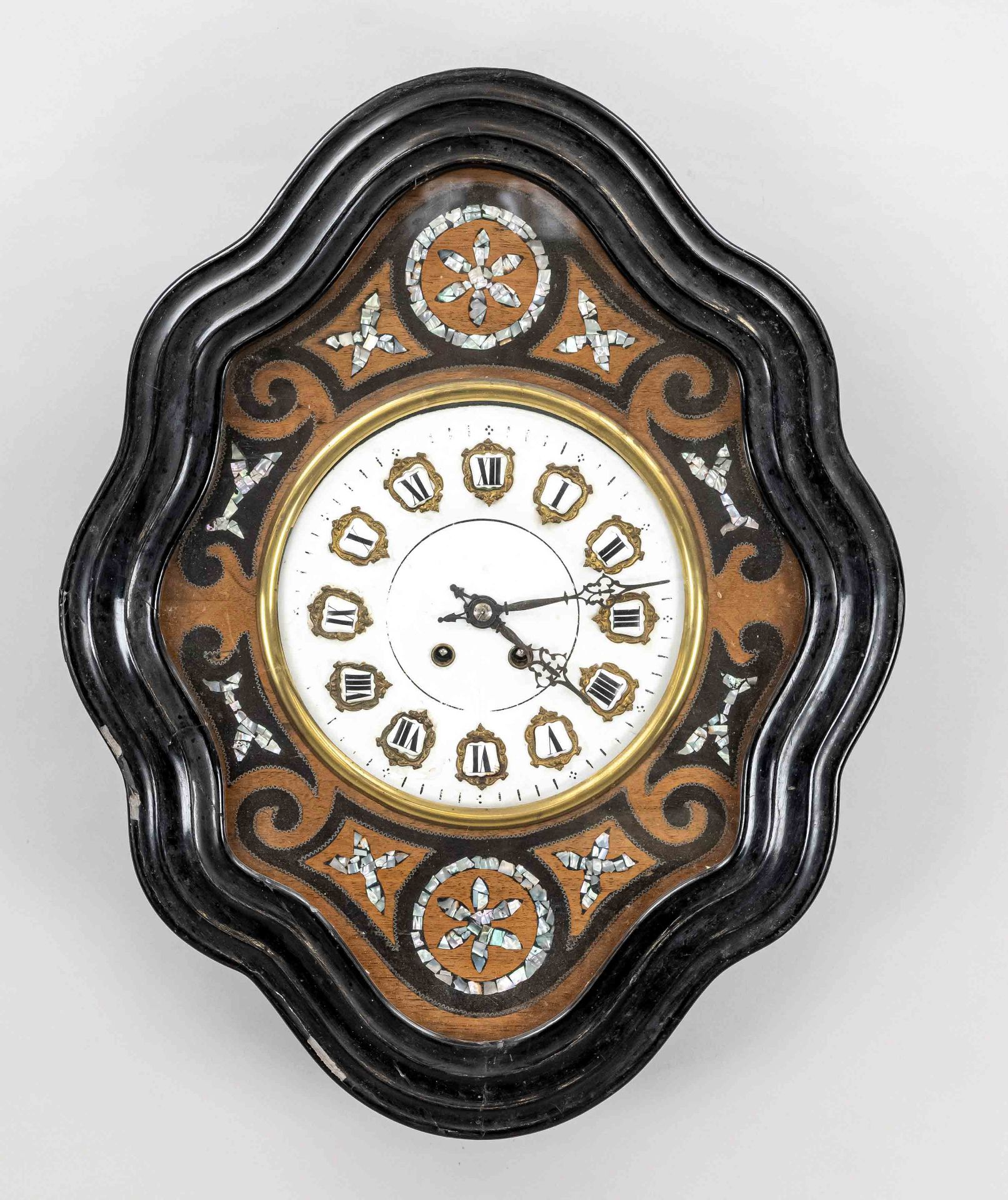 Wall clock wood ebonized, so called ox-eye, 2nd half of 19th century, frame with elaborate mother-