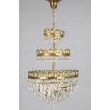 Crystal chandelier, 20th c., 3 stepped brass wreaths with crystal glass hangings, 3-light, h. 74
