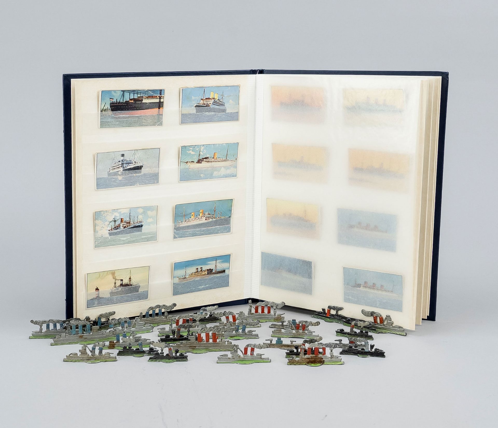 30 Warships, Germany, 1.V. 20th c., pewter, polychrome painted, l. to 5,5 cm. Comes with an album of