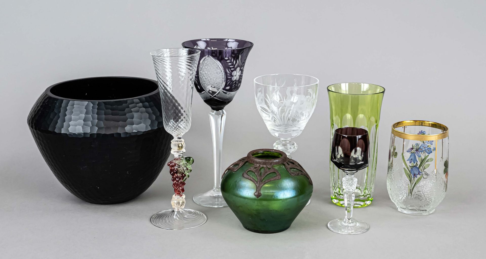 Set of eight pieces, 20th century, different makers, clear and colored glass, some with gold