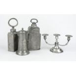 Pewter conglomerate, 18th/19th c., consisting of a 3-light candelabrum with vase grommets, h. 15 cm.