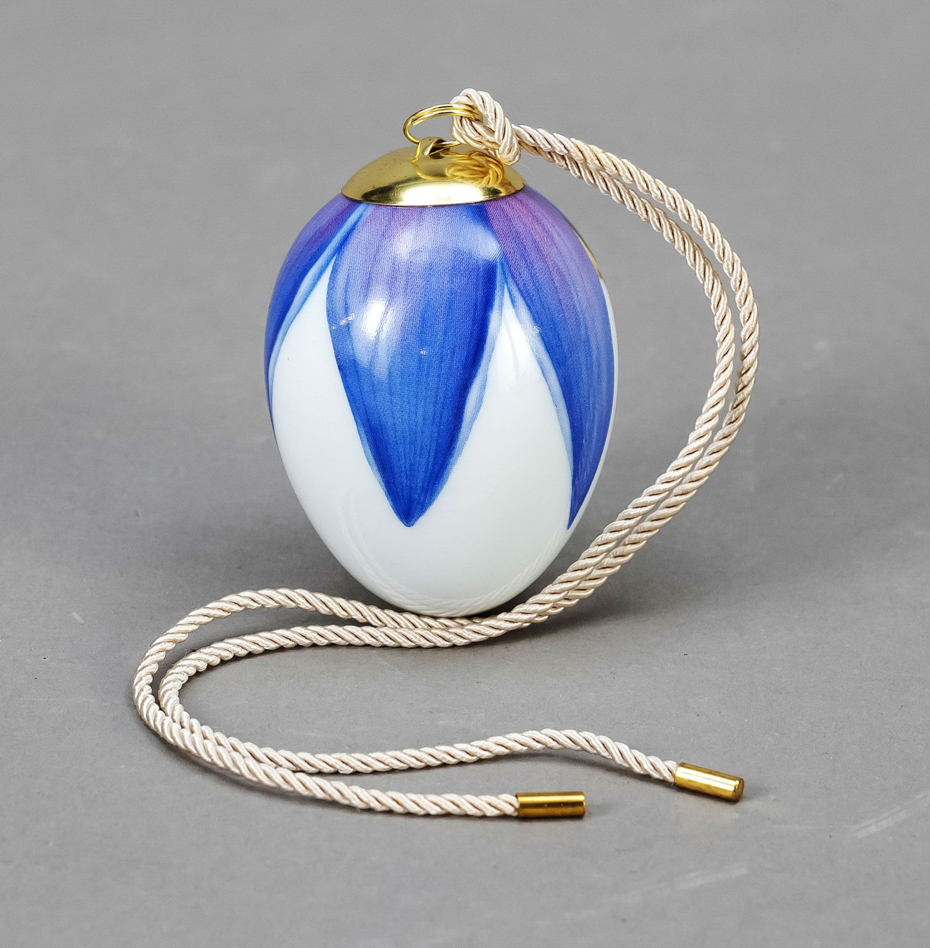 Easter egg, Royal Copenhagen, 20th c., polychrome painted in the shape of a mallow bud, brass holder