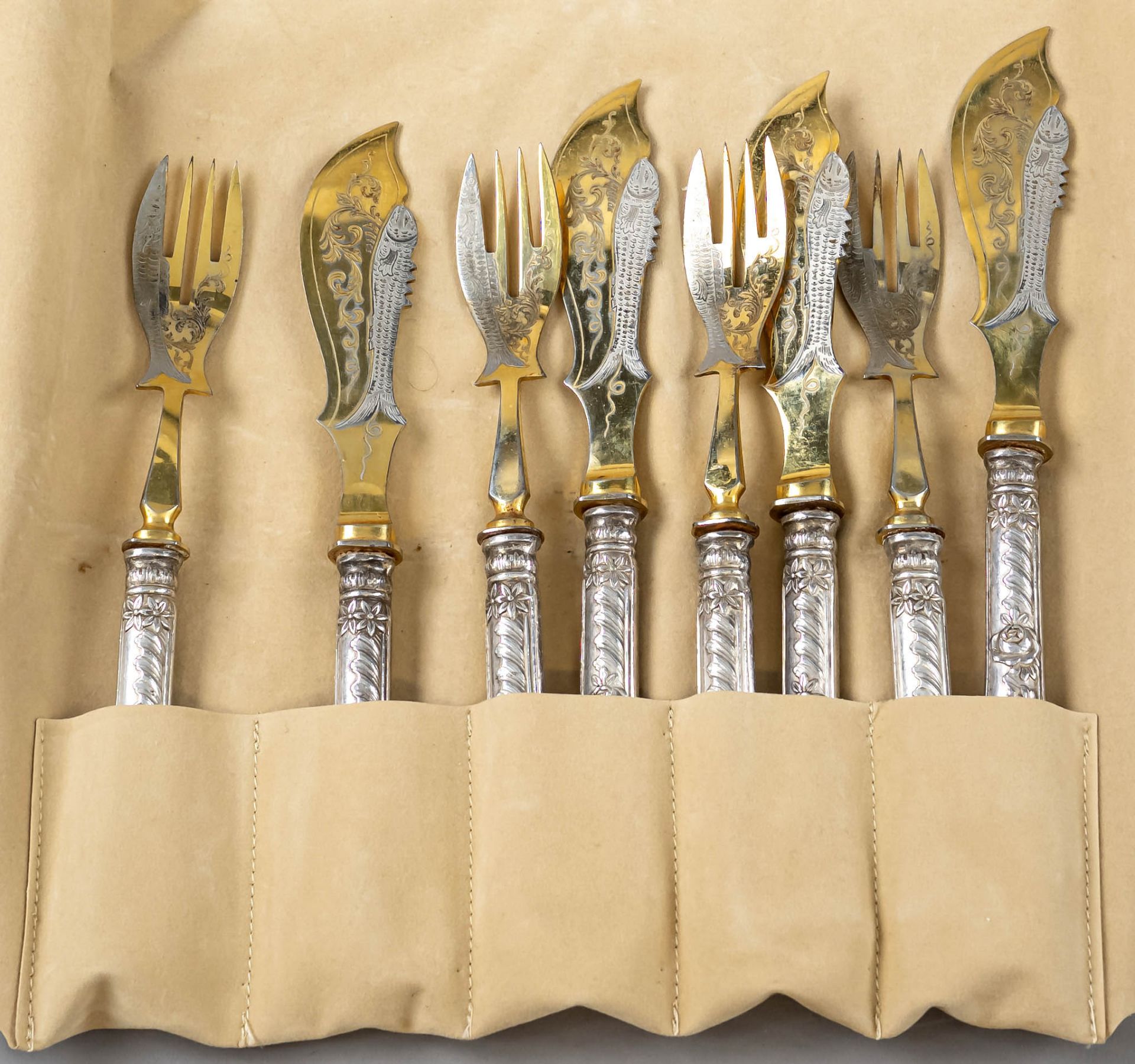 Fish cutlery for four persons, around 1900, silver tested, partial gilding, filled pistol handles