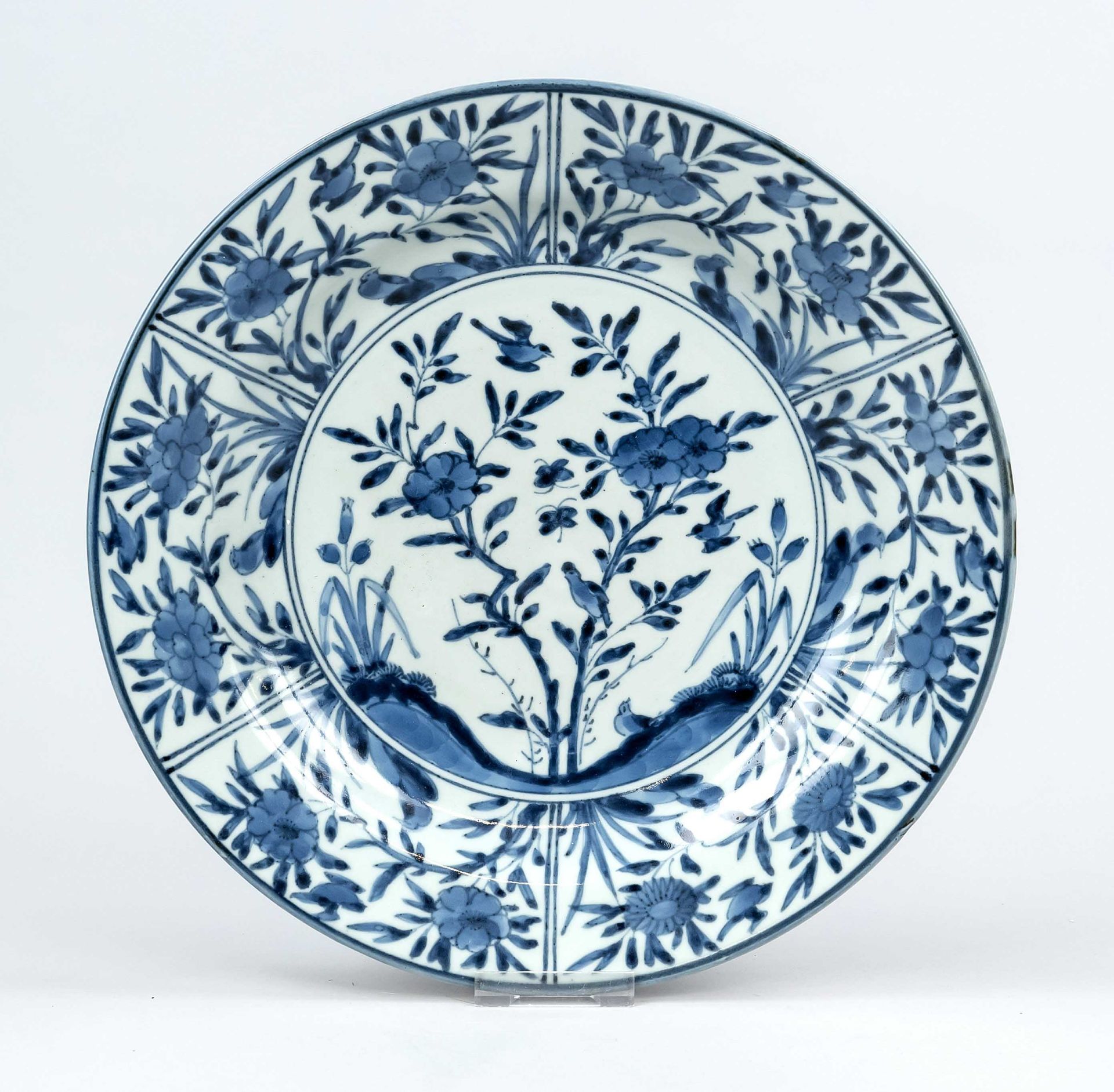 Kangxi-style blue and white plate, China, 20th c., porcelain with cobalt blue and white decoration