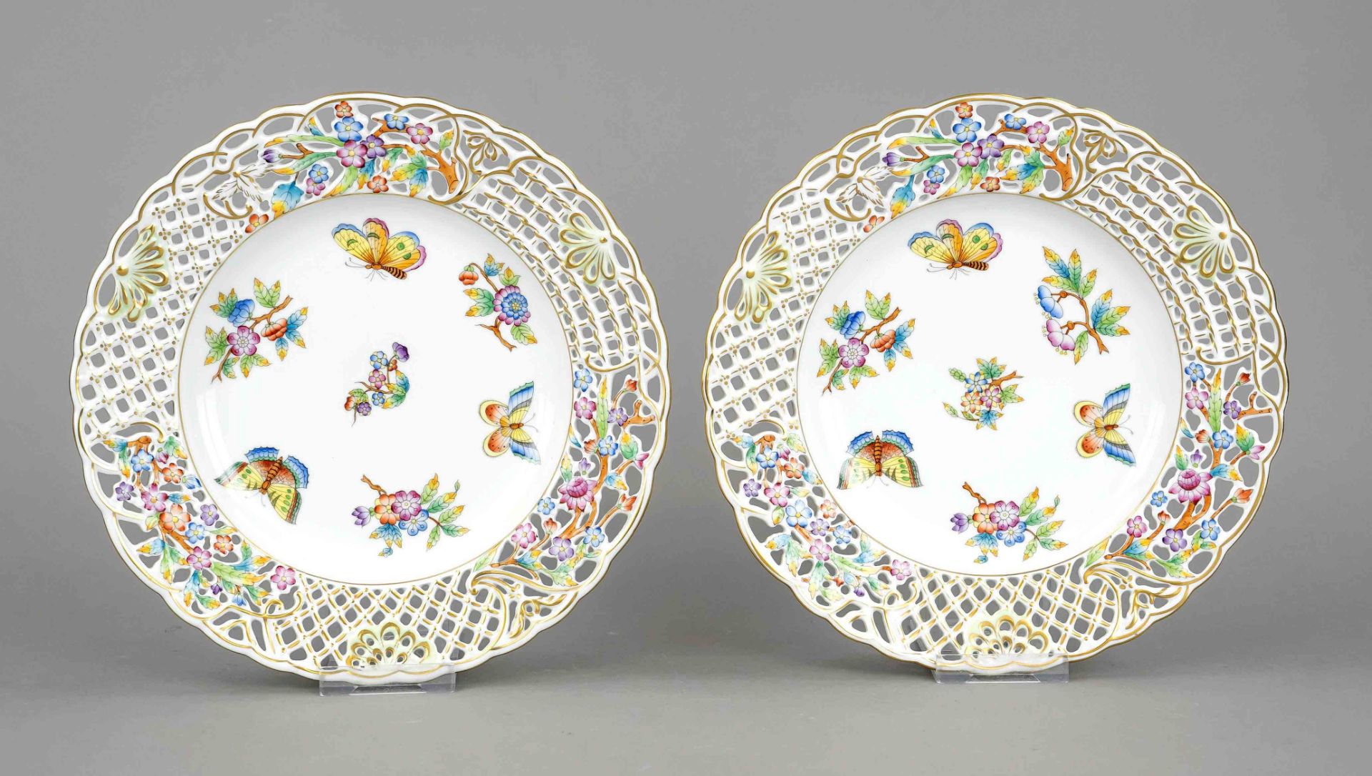 Pair of breakthrough plates, Herend, Hungary, 20th century, curved form, openwork flag with