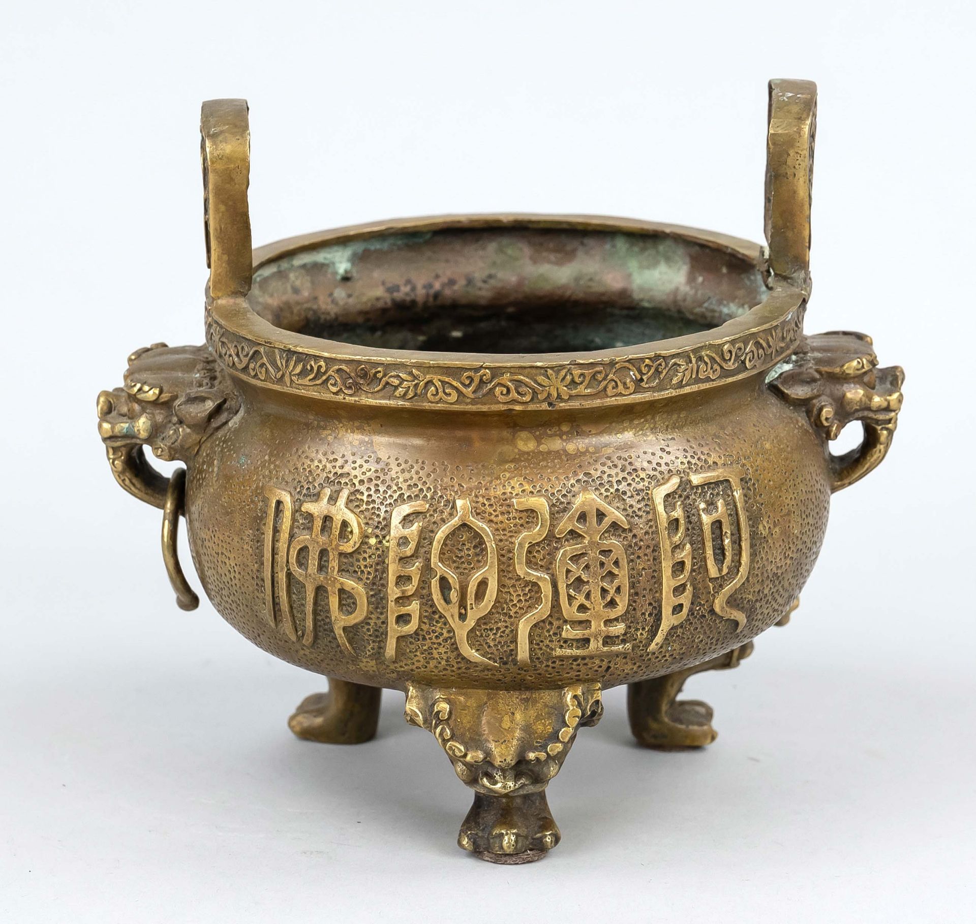 Buddha censer, China, 20th/21st century, yellow metal patinated, tripod type ding with lion